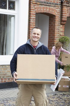 Man and van loading furniture for a move in Edgware