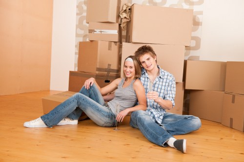 Commercial movers loading office items for transport