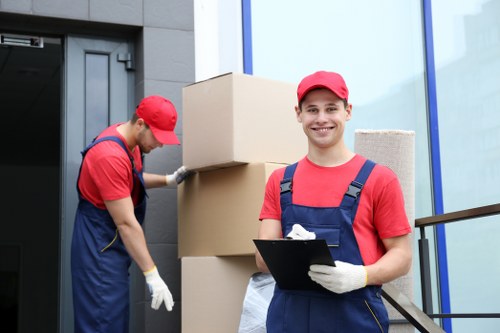 Removal van and moving team prepared for a local move in Edgware