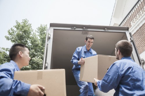 Edgware man and van team assessing a property entrance for safe moving access