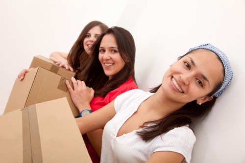 Professional movers handling household items during an Edgware relocation