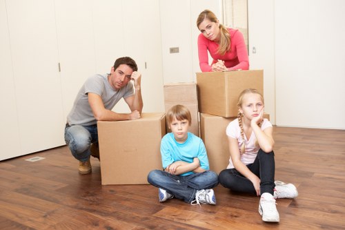 Careful loading of boxes and furniture into a moving van