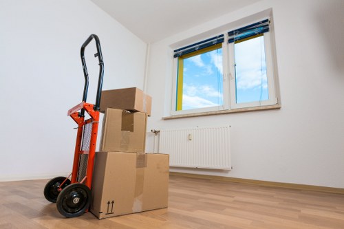 Moving day checklist and packed boxes ready for collection