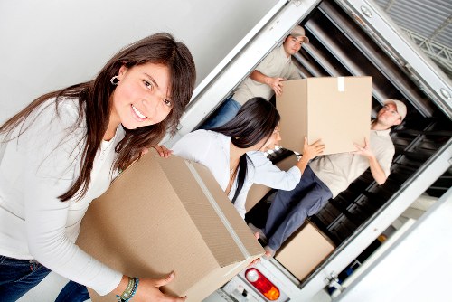 Local moving team handling furniture and boxes in Edgware