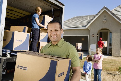 Professional movers loading household items near Edgware homes